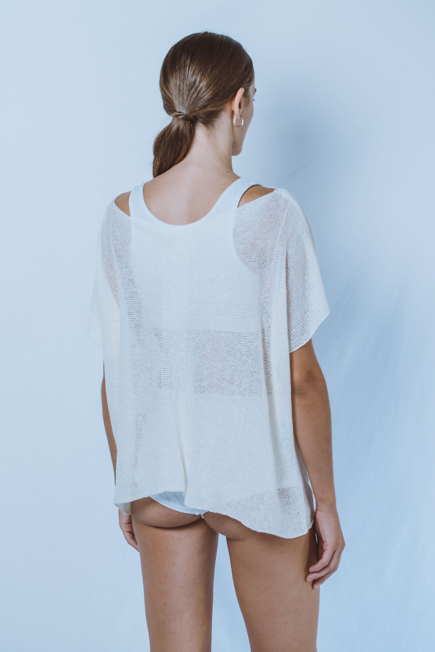 Oversized top with denser lines