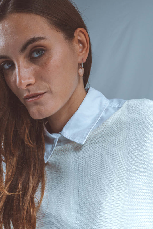 Oversized top with denser lines