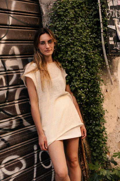 Oversized top with one straight side and one V-shaped side